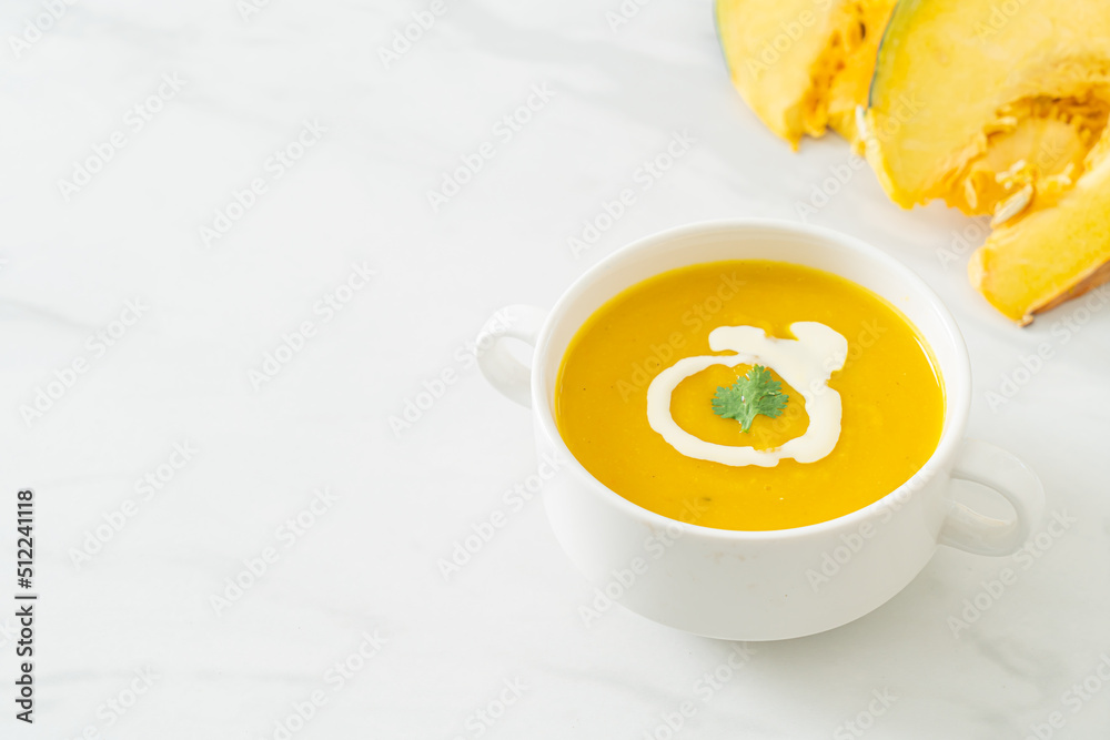 pumpkin soup in white bowl pumpkin soup in white bowl