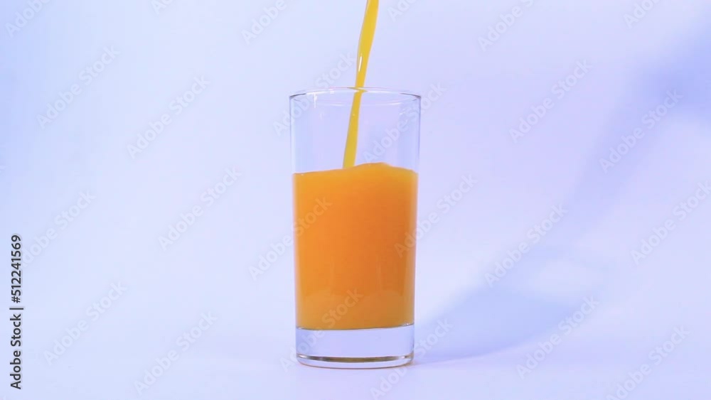 a glass of Orange juice on white and Isolated glass with shadow a glass of Orange juice on white and Isolated glass with shadow
