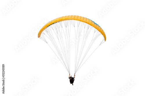 The sportsman flying on a paraglider. Beautiful paraglider in flight on isolated white background. photo