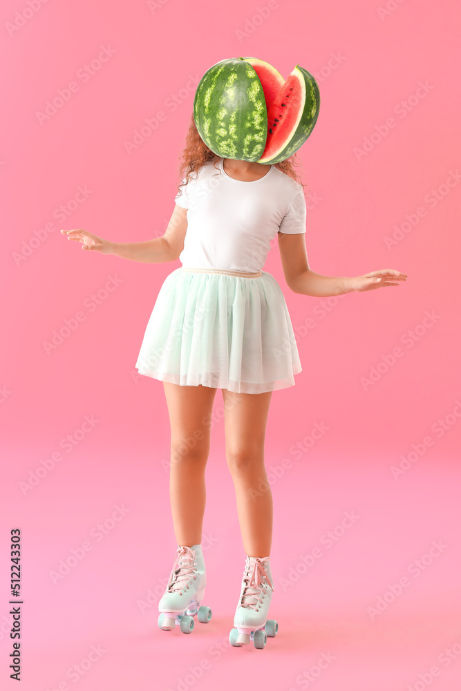 Beautiful young woman on roller skates with ripe watermelon instead of her head against pink background Beautiful young woman on roller skates with ripe watermelon instead of her head against pink background