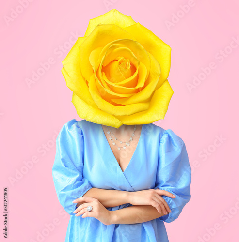Woman with yellow rose flow...