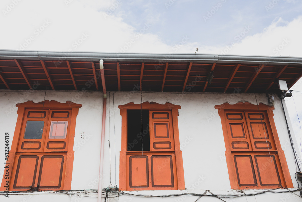 Typical Colombian facades, colorful windows