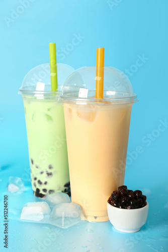 Plastic cups of tasty bubbl...