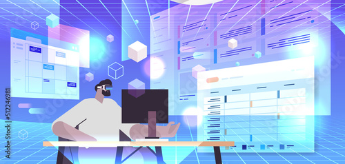 businessman in digital VR glasses working on laptop exploring virtual reality vision headset innovation metaverse