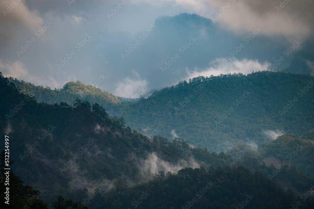 Obraz premium time clouds over the mountains