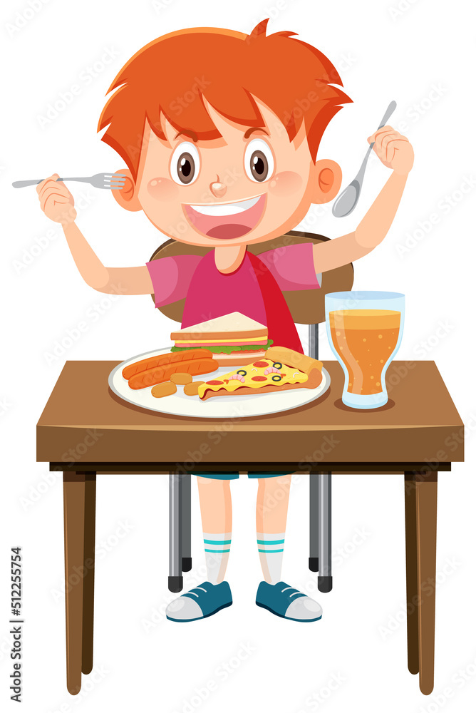 Happy boy enjoy eating food on table Happy boy enjoy eating food on table