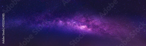 Milky way in the night sky and stars on a dark background with noise. with long exposure shooting