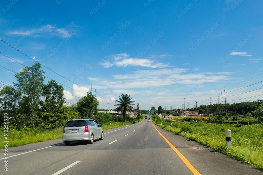 View of Road No. 4 in the south of Thailand in view of a speeding car. travel concept