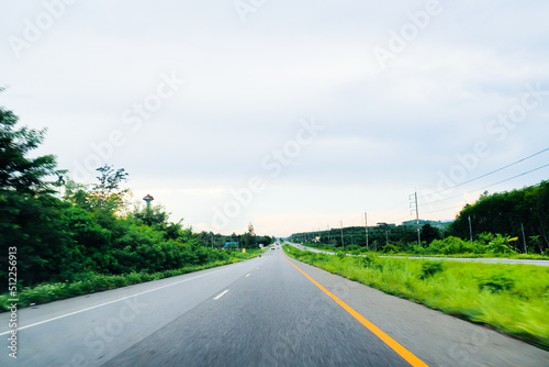 View of Road No. 4 in the south of Thailand in view of a speeding car. travel concept