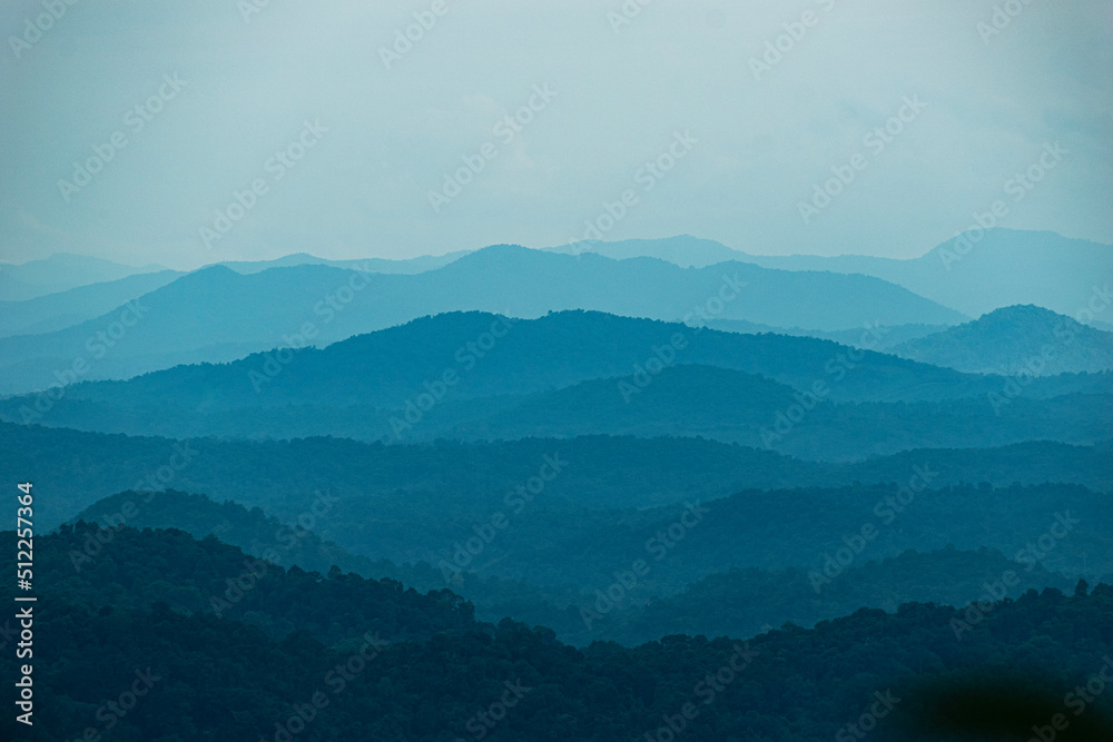 A picture of Western Ghats of India  taken in an early morning.The Western Ghats or the Western Mountain range is a mountain range that covers an area of 160,000 km2 in a stretch of 1,600 km parallel 