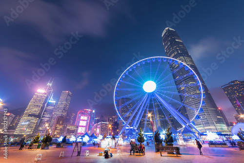 Photography Ferris Wheel in Hong Kong City at dusk