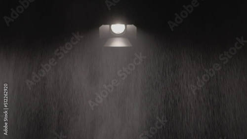 Searchlight beam light curtain in rainy day photo