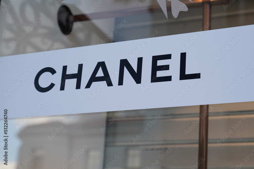 Chanel logo brand and sign text windows facade entrance store
