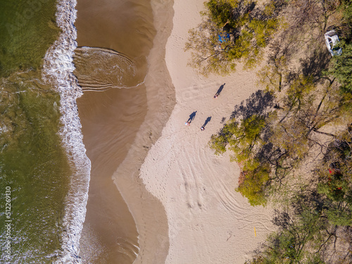 Beautiful aerial view of Costa Rica Beach Playa Rajada in Cuajiniquil Guanacaste in magical yellow sunset photo