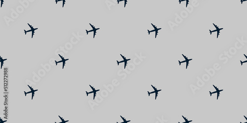 Seamless Airplane Symbols Pattern on Wide Scale Gray Background - Design Template in Editable Vector Format © bagotaj