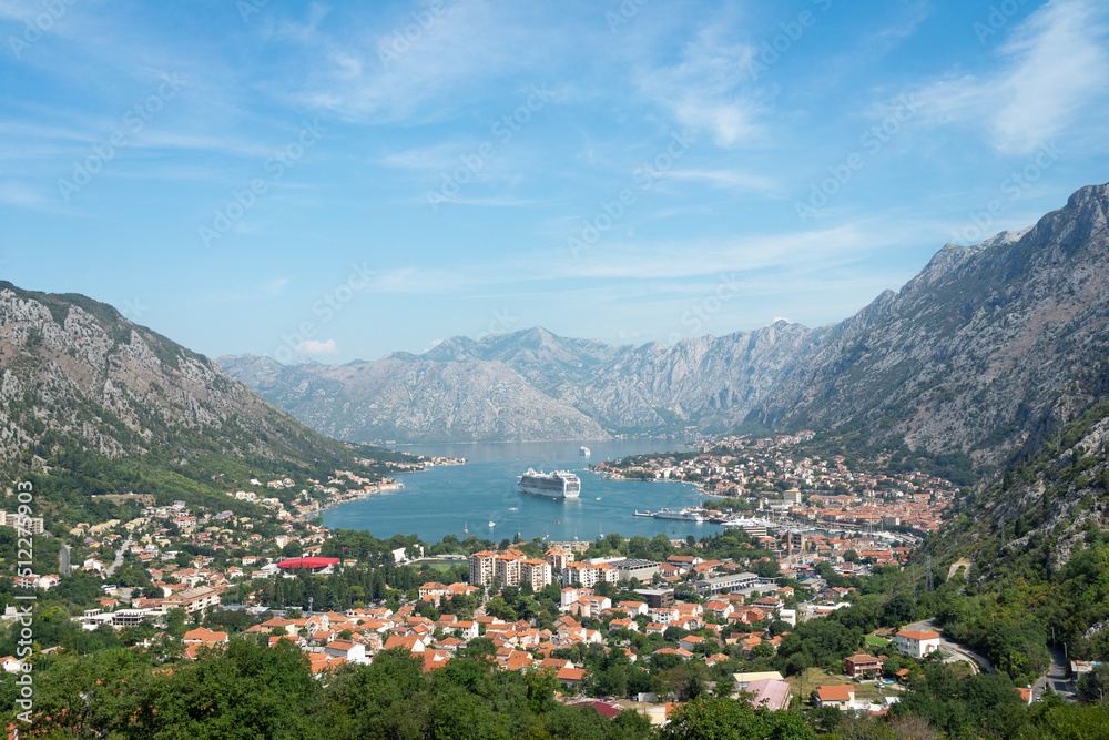 Fototapeta premium cruiseschip between the mountains in a bay 