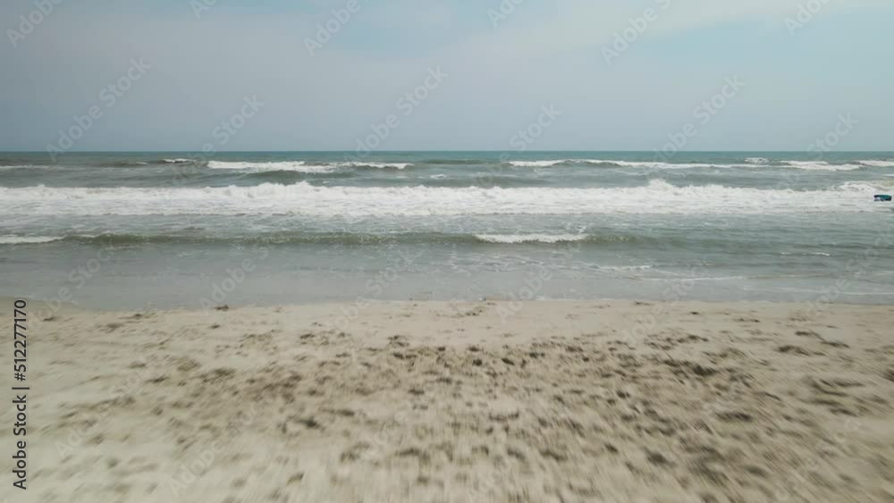 Spectacular wedding ceremony on beach camera flys through wooden frame out to sea Spectacular wedding ceremony on beach camera flys through wooden frame out to sea