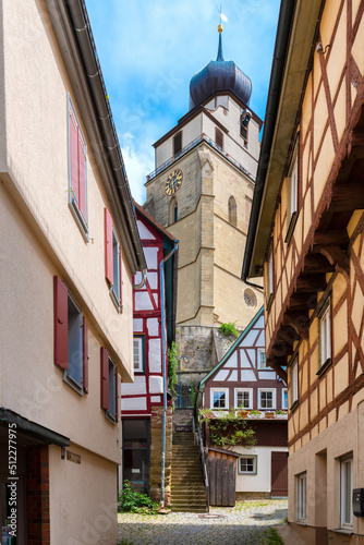 View from the narrow alleys in Herrenberg to the Stiftskirche, the landmark of the town. Black Forest, Germany