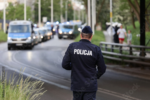 Polska Policja dyżurna, policjant prewencyjny z tarczą. photo