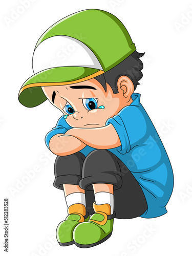 The little boy is sitting and contemplating while crying