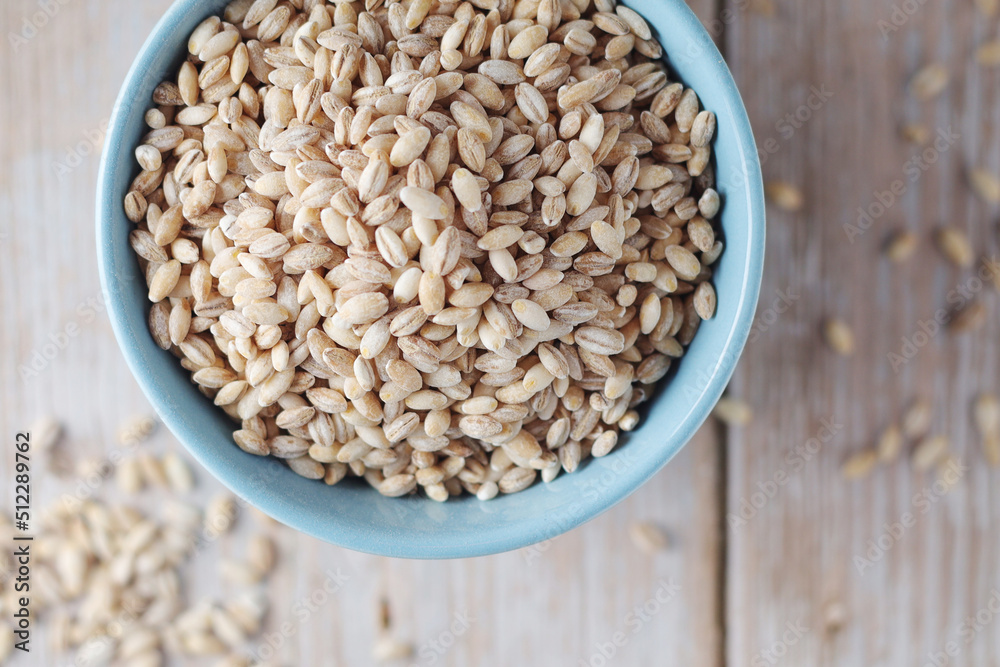 A bowl with raw barley seeds A bowl with raw barley seeds
