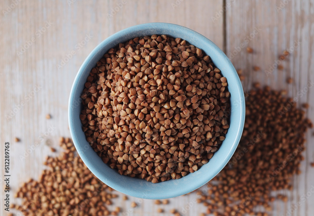 Buckwheat grain in a small ceramic bowl Buckwheat grain in a small ceramic bowl