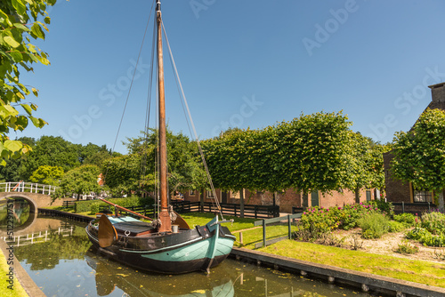 Wallpaper Mural Enkhuizen, the Netherlands. June 2022. The Zuiderzeemuseum, an open air museum with traditional Dutch cottages and flat bottomed boats Torontodigital.ca