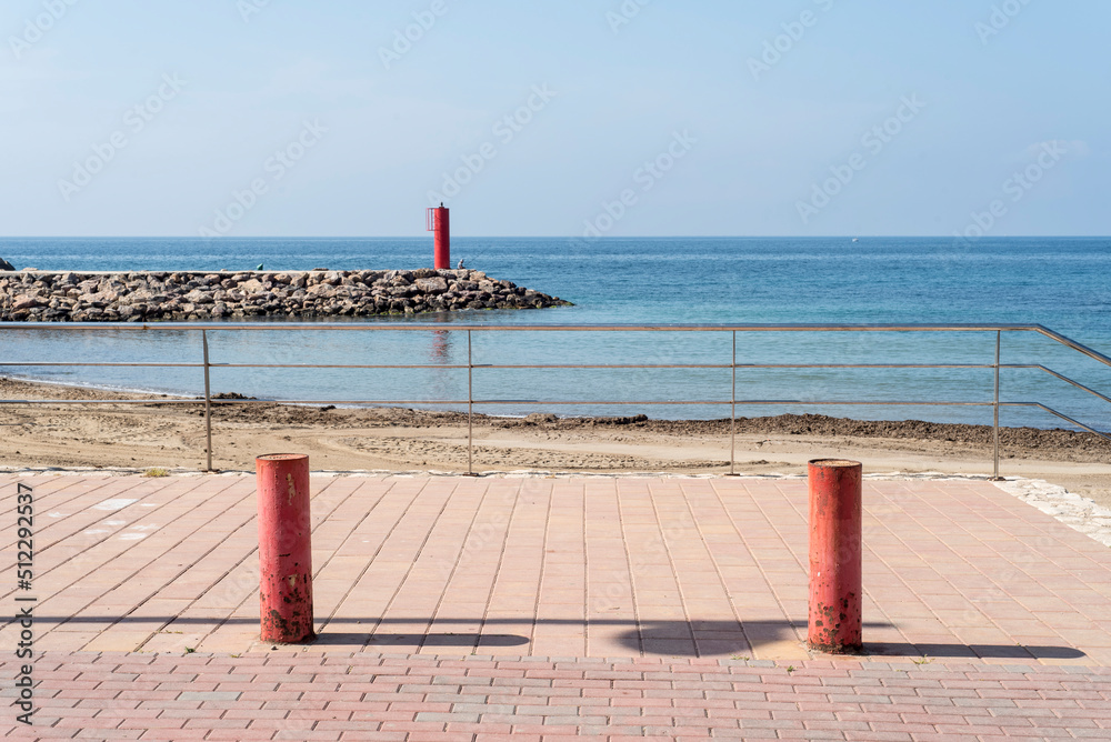 Obraz premium Set of three red posts in symmetrical composition