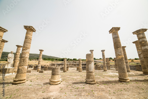 Ancient Roman ruins of Baelo Claudia on the beaches of Bolonia, Cadiz, Spain. photo