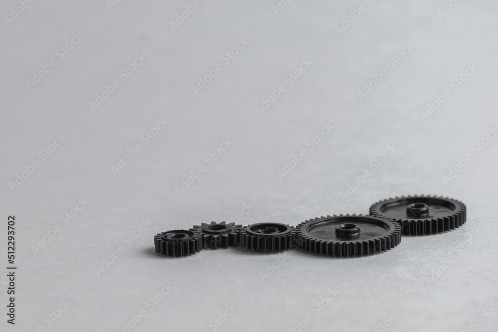 Serial connection of gears. Concept-relationship of economic processes. Teamwork, strategy, business idea. Economic integration Serial connection of gears. Concept-relationship of economic processes. Teamwork, strategy, business idea. Economic integration