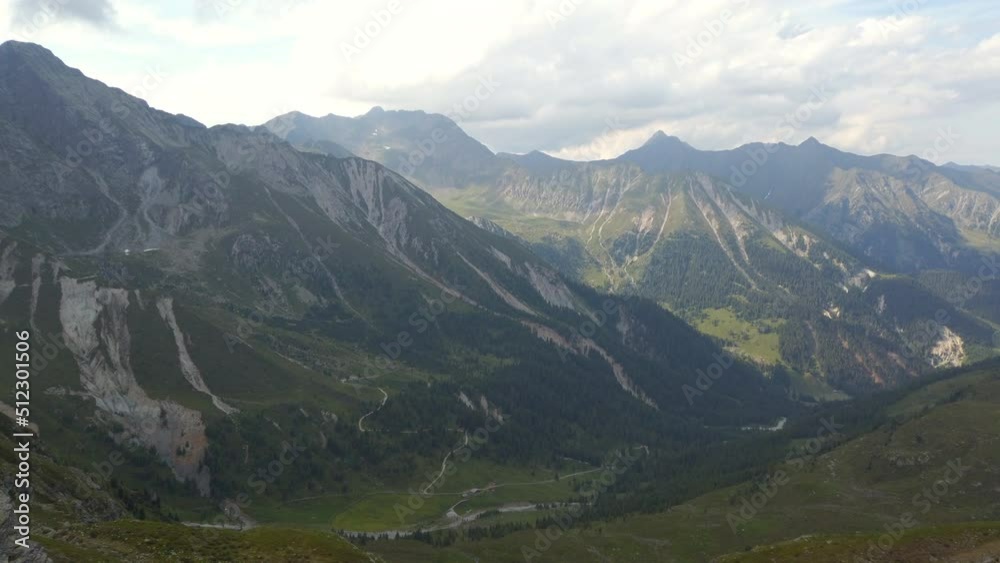 View of Dolomites valley and peaks near Brixen, Italy, 4k footage slight pan right View of Dolomites valley and peaks near Brixen, Italy, 4k footage slight pan right