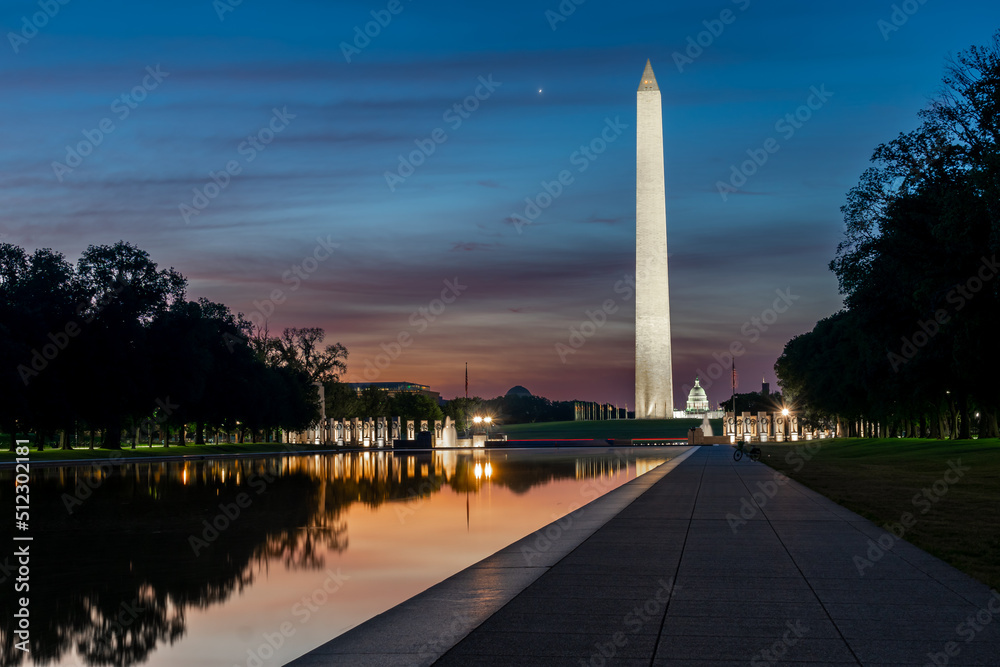 World War II Memorial Reflected in the Reflecting Pool With Washington Monument and US Capitol In the Background