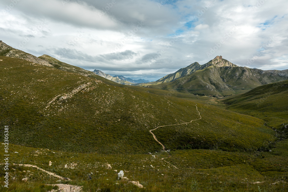 Fototapeta premium Hiking trail between the mountains in the Witfontein nature reserve with mountain at the back.