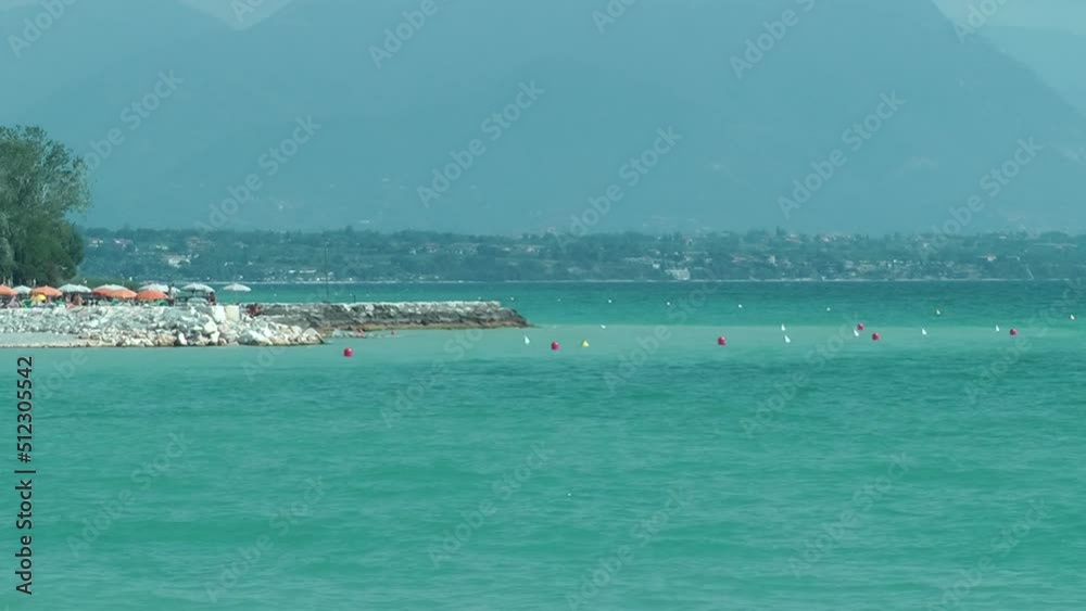 Lake Garda's blue water (Desenzano del Garda, Italy) Lake Garda's blue water (Desenzano del Garda, Italy)