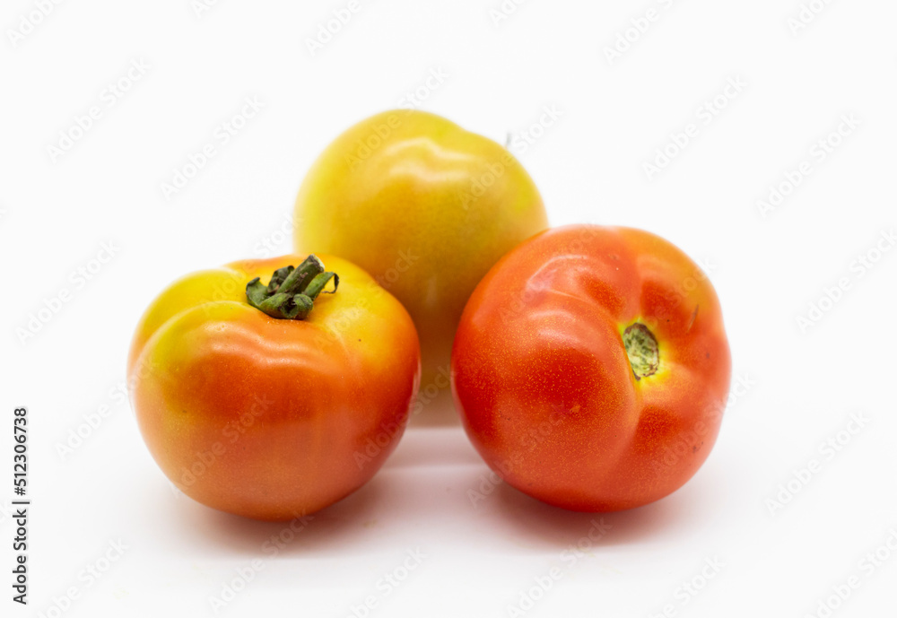 organic tomatoes isolated on white background organic tomatoes isolated on white background