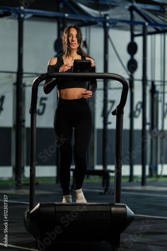 Female athlete running on a treadmill