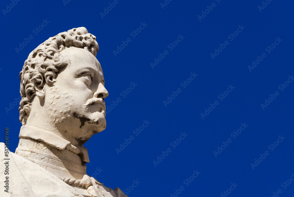 Ferdinando I Medici, Grand Duke of Tuscany. A marble statue erected in 1594 in the historical center of Pisa (with blue sky and copy space)