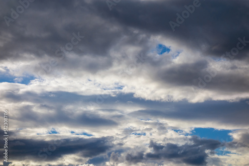 Dramatic autumn sky with clouds as natural background