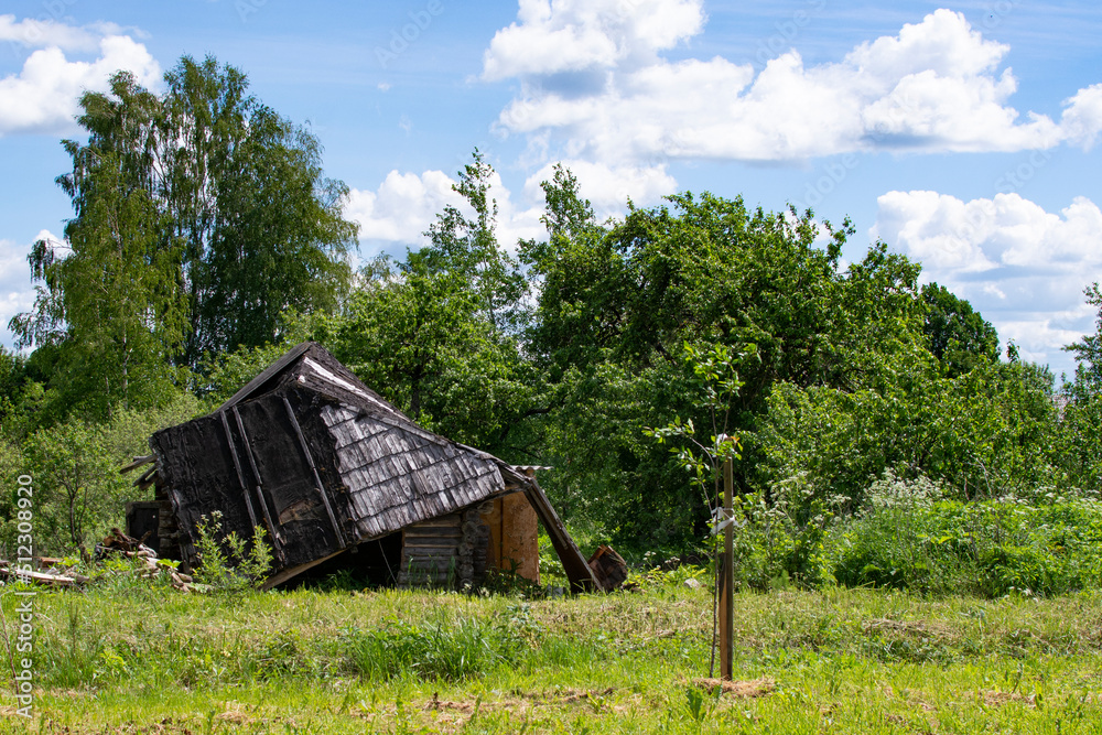 Fototapeta premium an old abandoned wooden house in the village