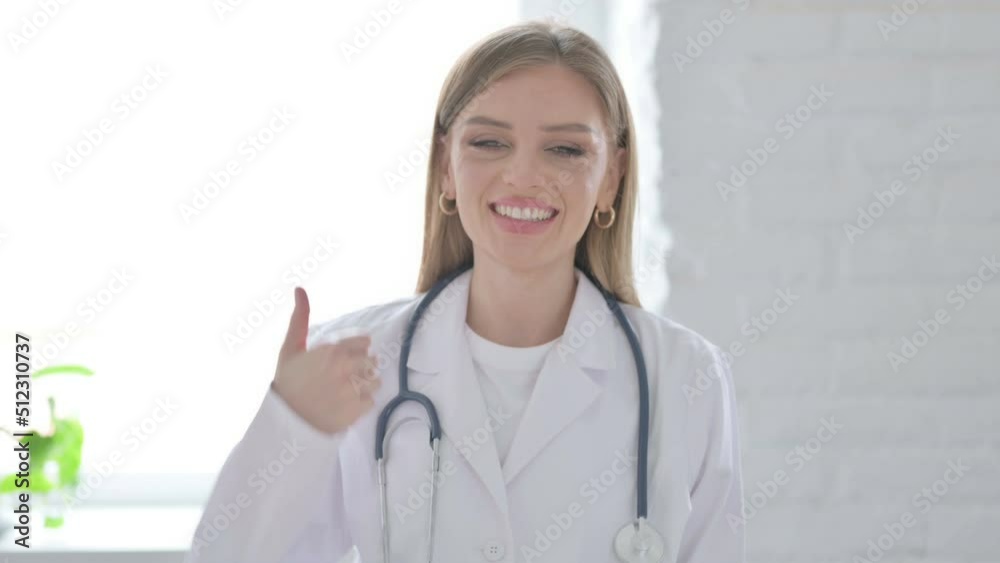 Portrait of Lady Doctor showing Thumbs Up Sign Portrait of Lady Doctor showing Thumbs Up Sign