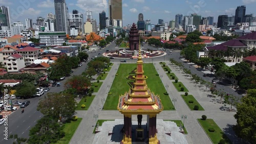 Aerial view of Independence Monument and the King Norodom Sihanouk memorial, bottom, in Phnom Penh, Cambodia. photo