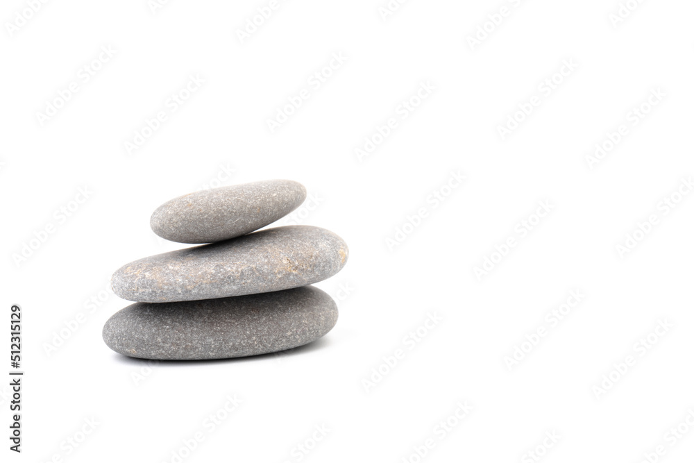 Zen stones on a light background. Minimalistic concept. Zen balance miditation concept. For branding and product presentation. Zen stones on a light background. Minimalistic concept. Zen balance miditation concept. For branding and product presentation.