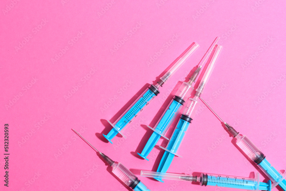 Disposable plastic syringe prepared for injection and vaccination in the hospital. The concept of medicine and health Disposable plastic syringe prepared for injection and vaccination in the hospital. The concept of medicine and health