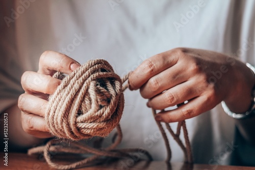 hands with rope