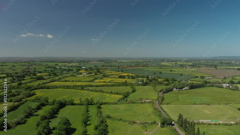 A slow aerial flight over the patchwork of fields in Wiltshire UK A slow aerial flight over the patchwork of fields in Wiltshire UK