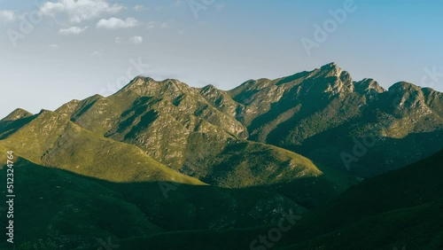 4K Time lapse of mountains. George and Cradock peak part of the Outeniqua mountains in the morning with clouds. photo