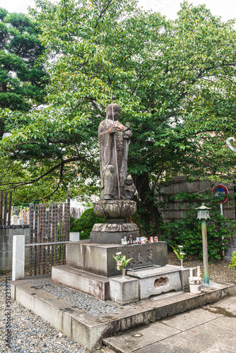 Statue in the Garden of Chokoku Temple in Tokyo, Japan 