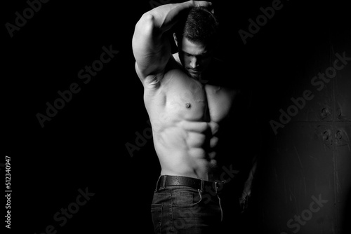 Leinwand Poster Muscular and sexy torso of young man having perfect abs, bicep and chest