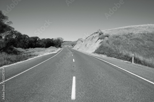 New Zealand Kaikoura road. Black and white vintage photo style.