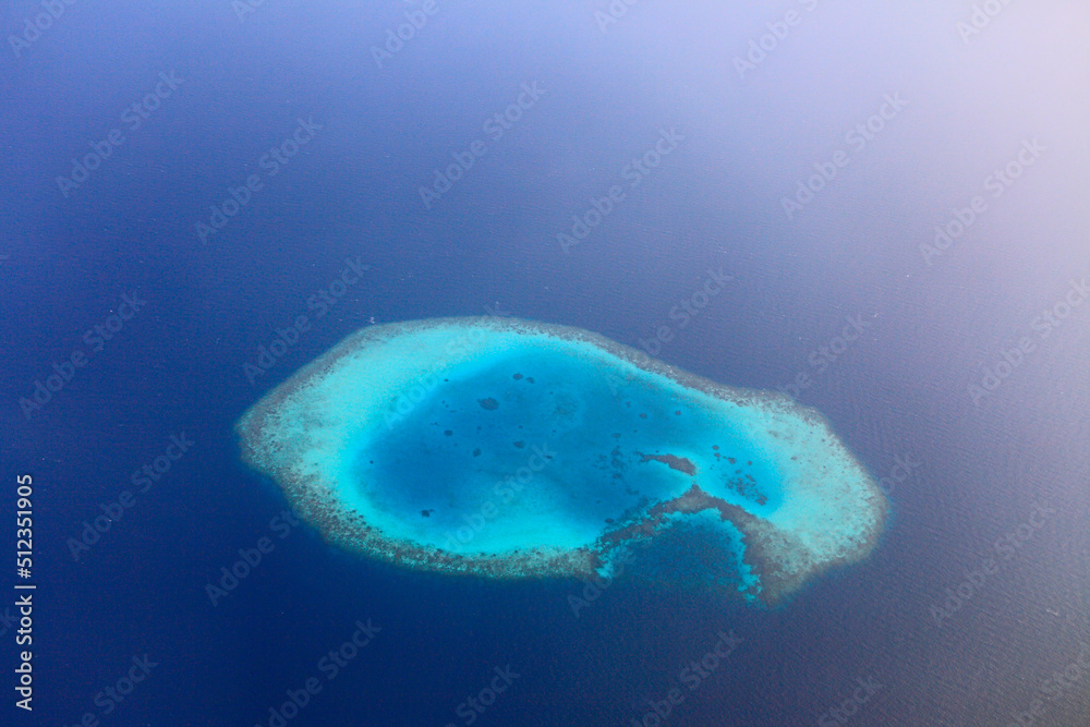 Naklejka premium Aerial view of a maldivian island, Maldives